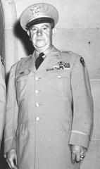 Brigadier General William T. Sexton standing in front of Sixth Army Headquarters
