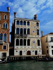 Ca' Dario Palace on Venice's Grand Canal, historic 15th century building with elaborate facade