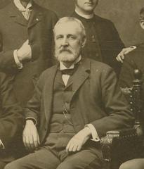 Group portrait of Acanthus Club members posing in photographer's studio in 1898 with names and occupations labeled