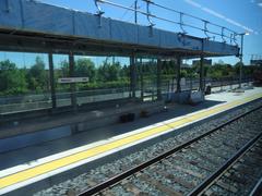 View out the left window of a train traveling from Union to Pearson in 2015 showing urban cityscape and sky