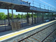 View through left window of a train from Union Station to Pearson Airport showing railway tracks and cityscape