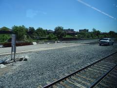 View from the left window on a train trip from Union Station to Pearson Airport showing cityscape and railway tracks