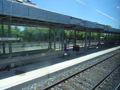View through the left window of a train traveling from Union Station to Pearson Airport showing urban landscape and railway tracks