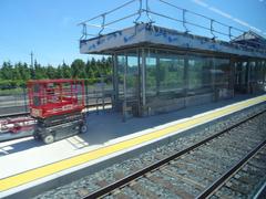 View through the left window of a train traveling from Union to Pearson, showing scenery outside