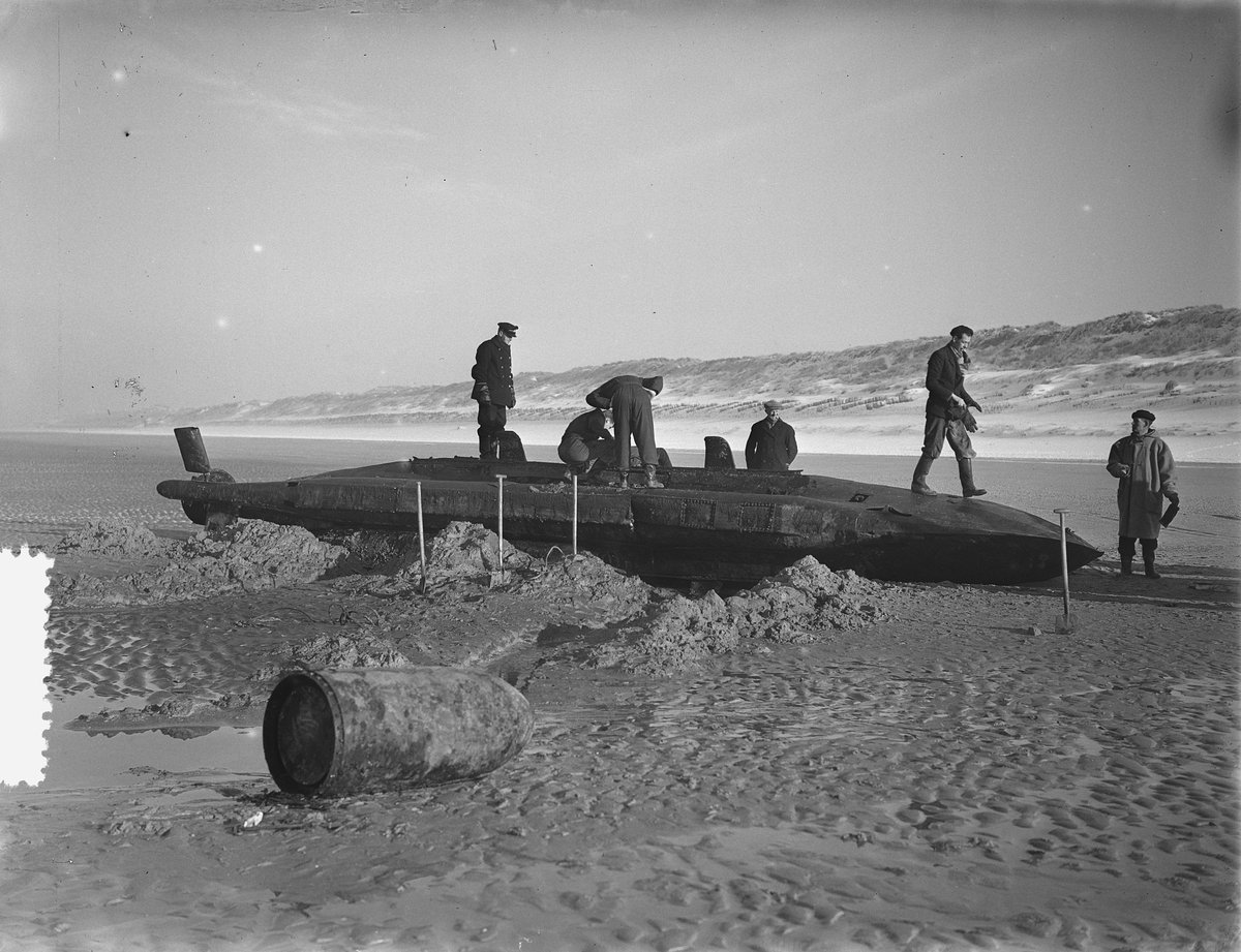 Two-person German torpedo submarine on the beach at Castricum