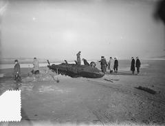 Two-person German submarine torpedo on the beach at Castricum, North Holland, 1952