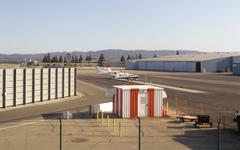 Aerial view of Van Nuys Airport from a train on tracks to the north