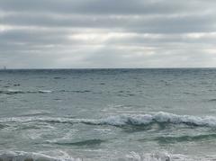 Pacific Ocean view at Dockweiler Beach with clear sky and ocean waves