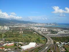 Wide view of Honolulu city skyline with international airport and Navy-Marine Golf Course