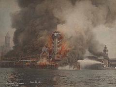 Firefighters battling a massive fire at Seattle's Grand Trunk Pacific Dock with fireboats Duwamish and Snoqualmie in action