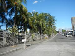 Cityscape of Eastwood City and Bagumbayan in Quezon City with modern buildings and clear blue sky