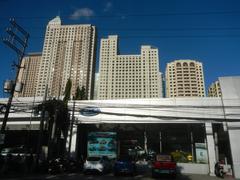 View of modern buildings in Eastwood City, Quezon City, featuring the new Mercury Drug MDC100 building