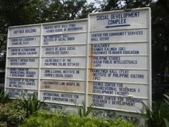 Exterior view of Ateneo Art Gallery at Ateneo de Manila University with modern architectural design and lush greenery