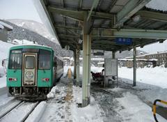 Winter scene inside Inotani Station with snow