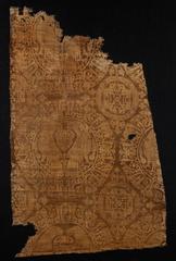 Fragment of two-colored samitum-woven silk textile from 11th-12th century Afghanistan or Iran