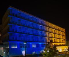 U.S. Embassy Islamabad illuminated with blue and yellow lights to show solidarity with Ukraine