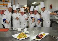 USDA Council of Chefs cooking demonstration with American and Indonesian chefs showcasing fusion recipes combining American and Indonesian ingredients