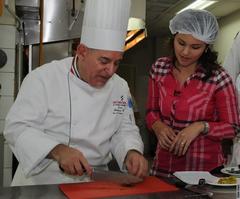 Cooking demonstration featuring American and Indonesian chefs blending culinary traditions