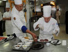 Indonesian and American chefs cooking together during USDA's When East Meets West program