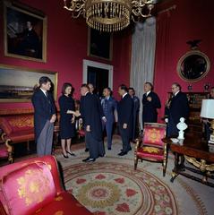 Jacqueline Kennedy shaking hands with Jiří Hájek at White House reception after JFK state funeral