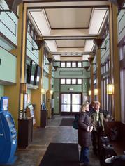 Interior of Milwaukee Airport Amtrak station in Milwaukee Wisconsin with seating and signage