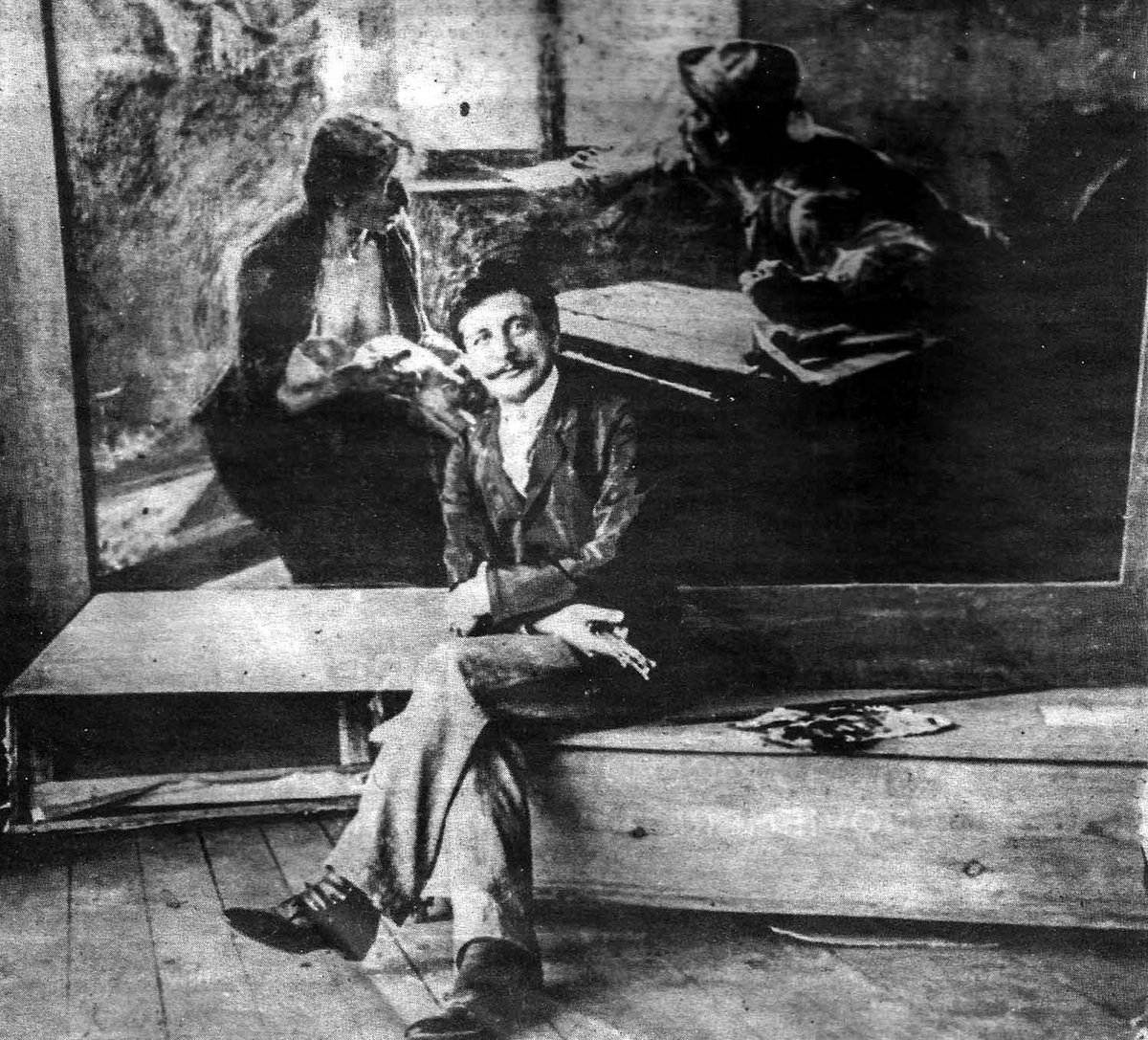 Portrait of Argentine painter Ernesto de la Cárcova in front of his artwork Sin pan y sin trabajo
