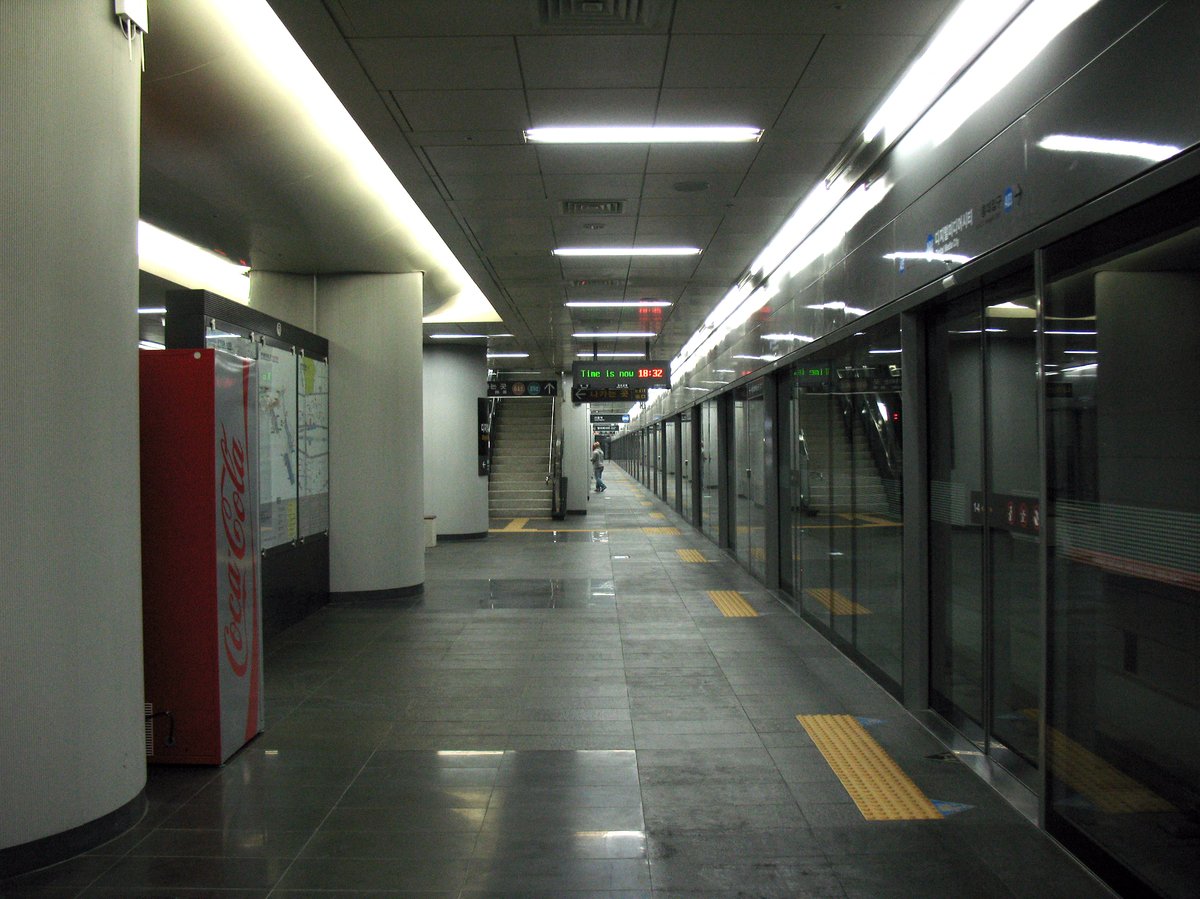 AREX Digital Media City Station platform with modern design and electronic signage