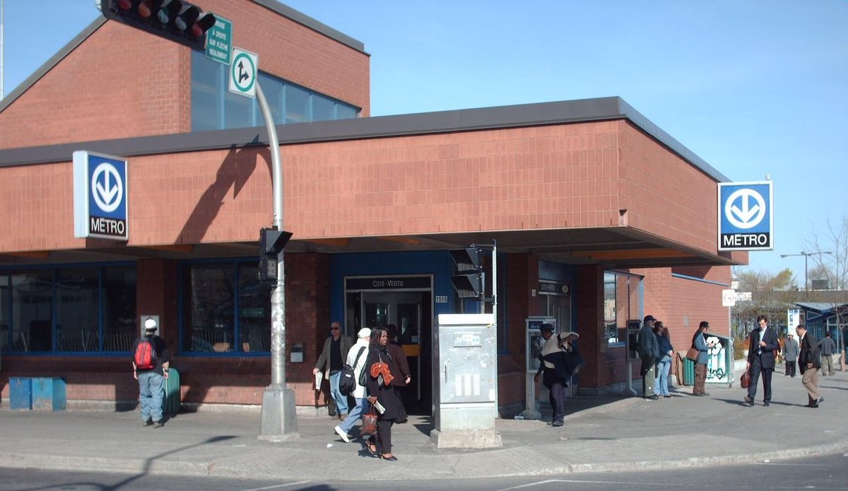 Cote Vertu Montreal metro station platform with signage and tracks