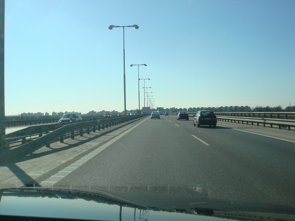 Harbour Bridge in Bratislava over the Danube River with city skyline