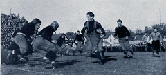Football running play during Michigan vs Penn game on November 12, 1910