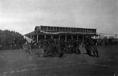 Vintage football game between Michigan offense and Chicago defense