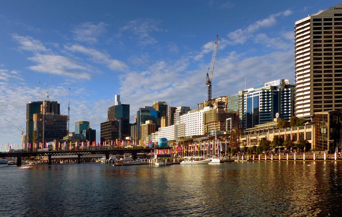 View of Cockle Bay in inner-city Sydney with waterfront buildings and boats