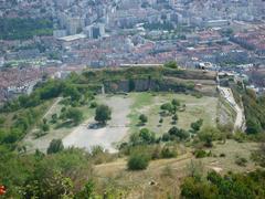 View of Glacis du Fort de la Bastille in Grenoble with cityscape and mountains
