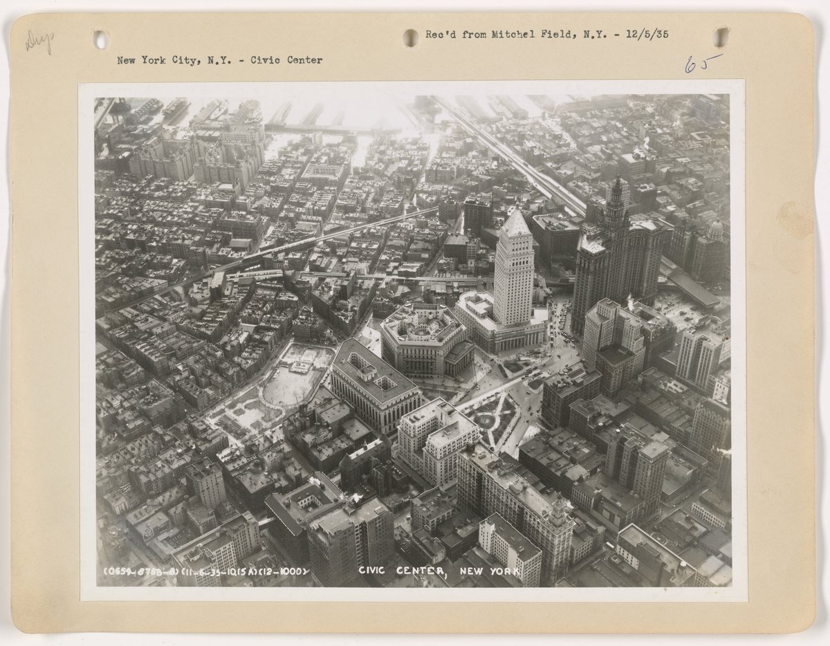 Aerial view of Manhattan skyline during daytime with tall skyscrapers and buildings
