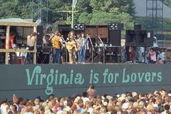 Crosby, Stills, Nash & Young performing live on stage during their 1974 reunion tour at Foreman Field, Old Dominion University, Norfolk Virginia