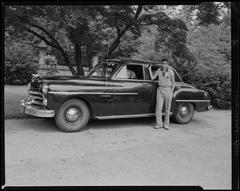 Albert Arzouhaljian standing at Forest Hills Cemetery