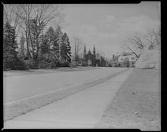 Historic black and white photograph of Forest Hills Cemetery featuring headstones and trees