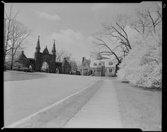 Forest Hills Cemetery historic monument and tombstones under trees