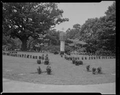 Forest Hill Cemetery entrance gate and trees in daylight