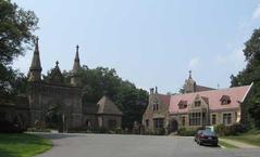 Forest Hills Cemetery entrance with monument and trees