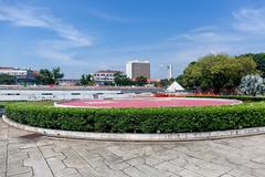 Open grassy area inside Fort Cornwallis with historical walls and greenery