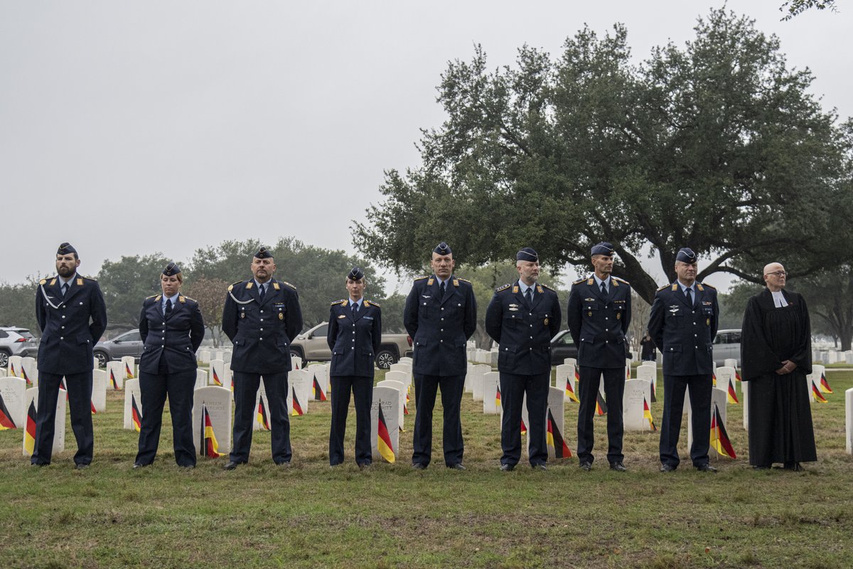 Soldiers civilians and community members at German Memorial Day ceremony Volkstrauertag at Fort Sam Houston National Cemetery Texas November 19 2023