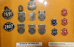 Vintage employee badges from 1930-1952 at San Francisco Cable Car Museum