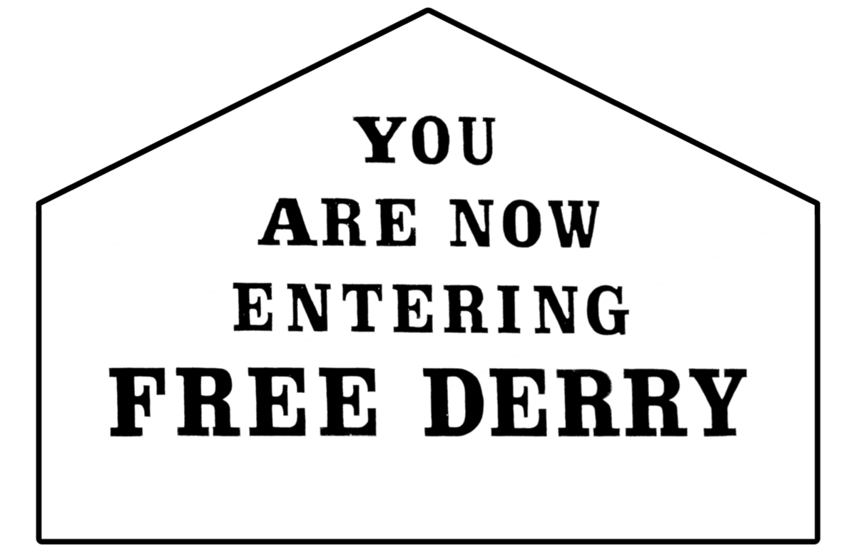 Building-side political sign in Derry saying You Are Now Entering Free Derry