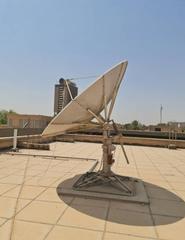 Baghdad University Radio Telescope BURT large radio telescope dome with blue sky