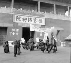 1948 Good Luck Dewey parade in Beiping with elephant carrying Thomas Dewey portrait