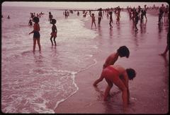 Children playing at the beach in Reis Park, Brooklyn, New York City