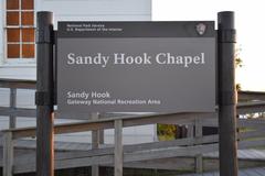 Sandy Hook Chapel Sign on wooden post