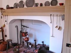 Historic kitchen interior of the Deshler-Morris House in Philadelphia with colonial-era furnishings and stove