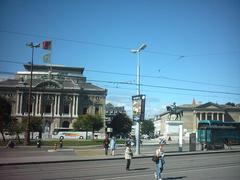Place Neuve square in Geneva Switzerland with historical buildings and bright blue sky